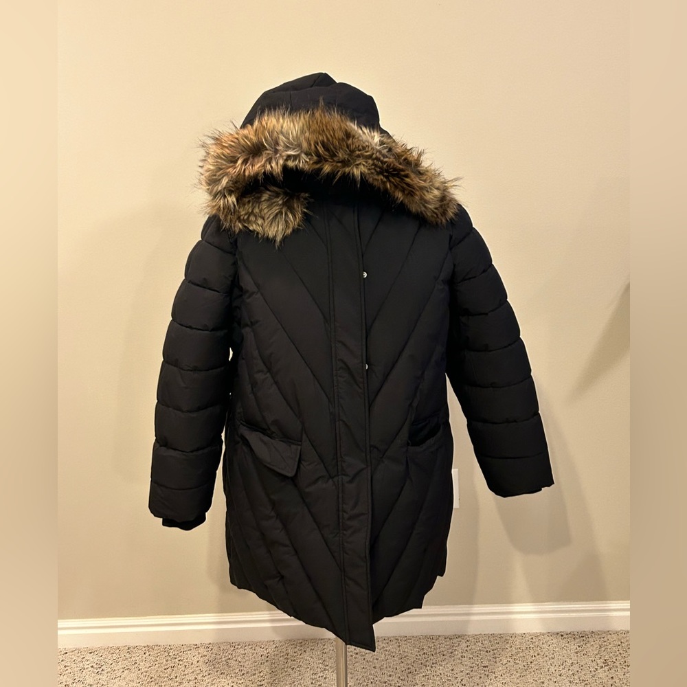 NWO tags/ Long Puffer Jacket with faux fur trimmed Hood.